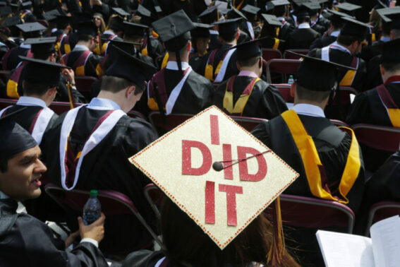 Image: Graduating student has "I Did It" written on her mortar board during Commencement Exercises at Boston College
